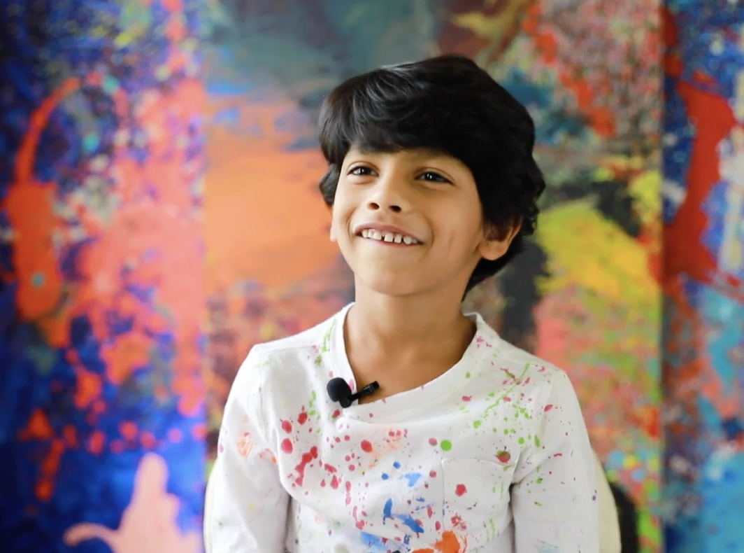 Image of Advait smiling at the camera.