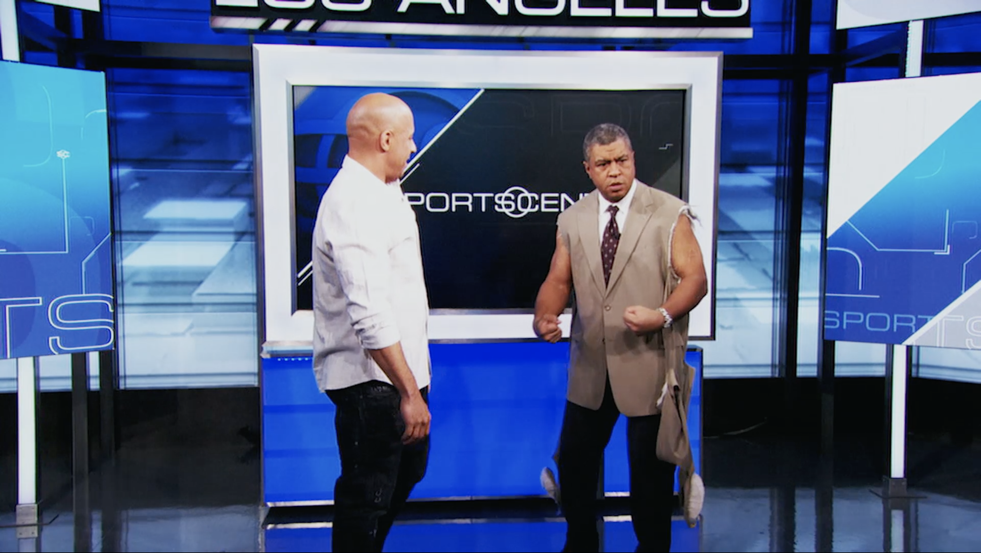 Stan and another man on the set of ESPN Sportscenter.