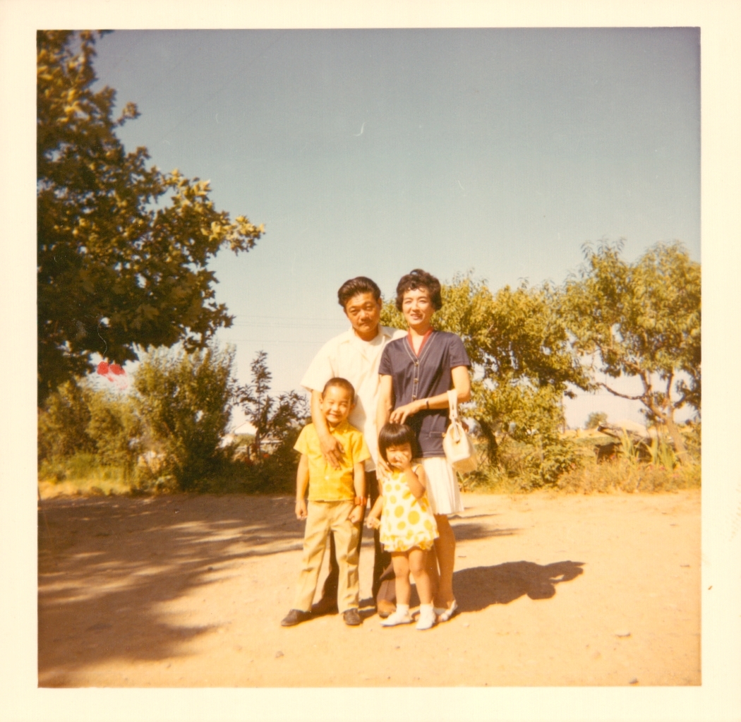 A photo of child Vicki and her family