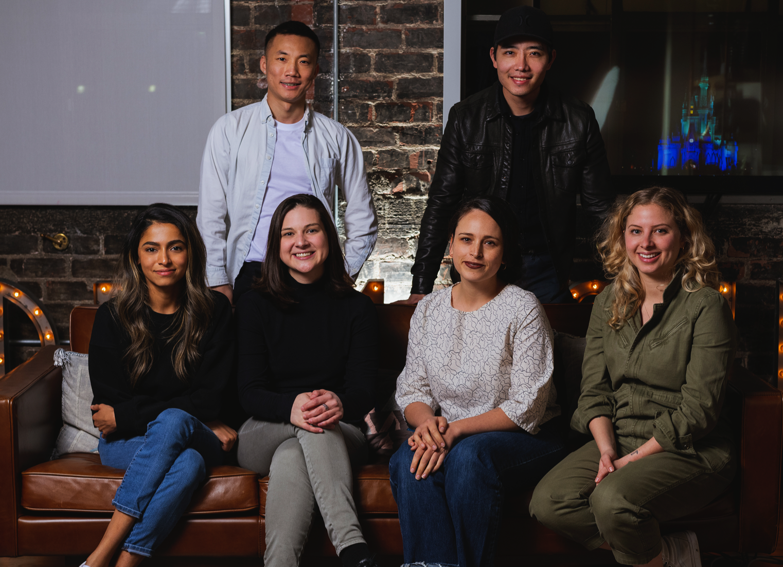 A group photo of six people.