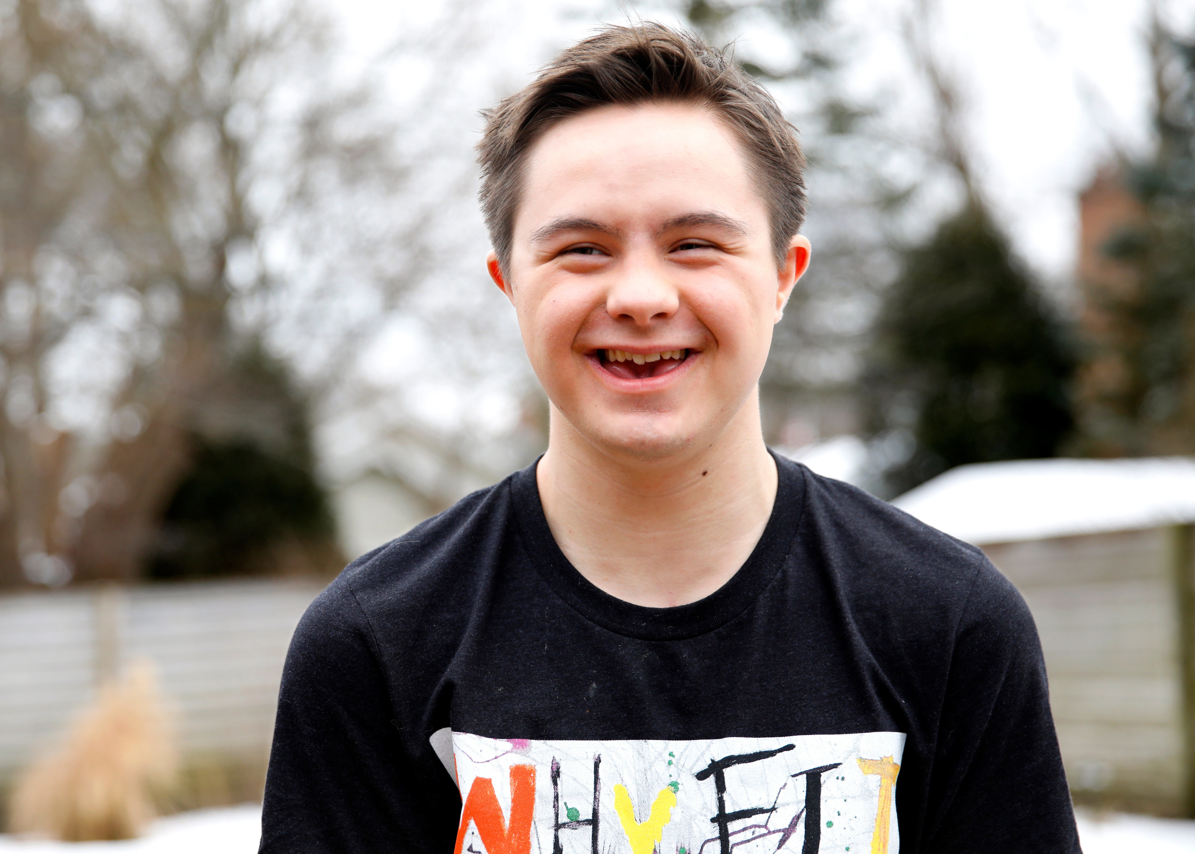 Image of Emmett smiling at the camera.